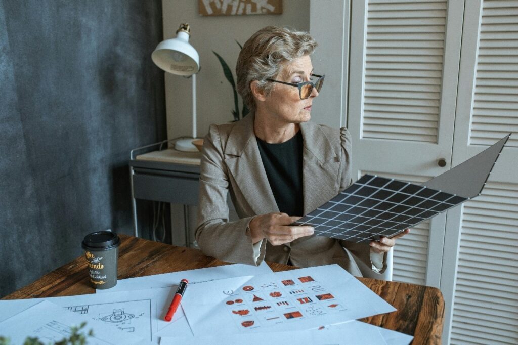 Tenancy Contract - women sitting and checking , Ofin Global provides all kind of contrats globally